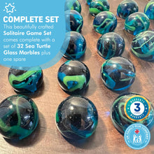 Load image into Gallery viewer, 30cm Diameter WOODEN SOLITAIRE BOARD GAME with SEA TURTLE GLASS MARBLES | classic wooden solitaire game | strategy board game | family board game | games for one | board games
