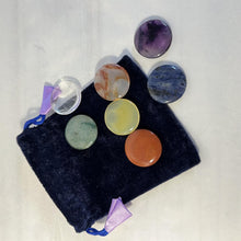 Load image into Gallery viewer, Set of 7 Chakra Discs supplied with a Velvet Bag | Discs include Clear Quartz, Amethyst, Sodalite, Green Aventurine, Yellow Onyx, Carnelian, and Red Jasper.