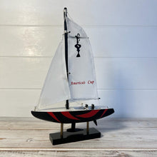 Load image into Gallery viewer, Americas Cup Model Yacht  - Black and Red hull | Sailing | Yacht | Boats | Models | Sailing Nautical Gift | Sailing Ornaments | Yacht on Stand | 23cm (H) x 16cm (L) x 3cm (W)