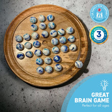 Load image into Gallery viewer, 30cm Diameter WOODEN SOLITAIRE BOARD GAME with JELLYFISH GLASS MARBLES | classic wooden solitaire game | strategy board game | family board game | games for one | board games
