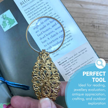 Load image into Gallery viewer, Petite Magnifying Glass with gold handle in leaf pattern, ideal for reading, precision work, crafting.