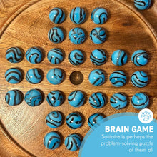 Load image into Gallery viewer, 22cm Diameter wooden SOLITAIRE BOARD GAME with BRILLIANT BLUE BRONTOSAURUS SWIRL GLASS MARBLES | classic wooden solitaire game | strategy board game | family board game | games for one | board games