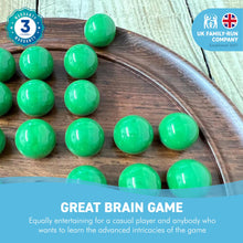 Load image into Gallery viewer, 30cm Diameter WOODEN SOLITAIRE BOARD GAME with Pea Green Glass Marbles | |classic wooden solitaire game | strategy board game | family board game | games for one | board games