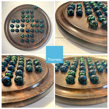 Load image into Gallery viewer, 30cm Diameter WOODEN SOLITAIRE BOARD GAME with SEA TURTLE GLASS MARBLES | classic wooden solitaire game | strategy board game | family board game | games for one | board games