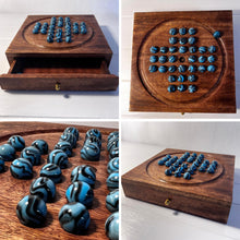 Load image into Gallery viewer, Wooden Solitaire with Drawer for Brontosaurus Marbles | Travel Games | Strategic & Traditional Games | Perfect for Adults & Family Fun