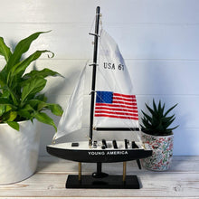 Load image into Gallery viewer, YOUNG AMERICA AMERICAS CUP MODEL YACHT | Sailing | Yacht | Boats | Models | Sailing Nautical Gift | Sailing Ornaments | Yacht on Stand | 33cm (H) x 21cm (L) x 4cm (W)