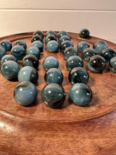 Load image into Gallery viewer, 30cm Diameter MANGO WOOD SOLITAIRE BOARD GAME with Midnight Blue Glass Marbles | |classic wooden solitaire game | strategy board game | family board game | games for one | board games