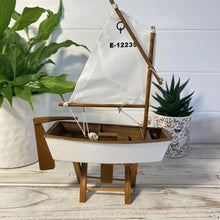 Load image into Gallery viewer, Decorative wooden model sailboat Optimist | 30cm (w) x 45cm (h) x 13.5cm (d) | Fully assembled model |Hand-painted and handmade from wood.