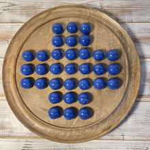 Load image into Gallery viewer, 30cm Diameter MANGO LIGHT BROWN WOOD SOLITAIRE BOARD GAME with OPAL BLUE Glass Marbles | |classic wooden solitaire game | strategy board game | family board game | games for one | board games