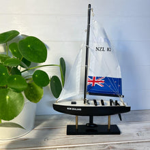 Load image into Gallery viewer, NEW ZEALAND AMERICAS CUP MODEL YACHT | Sailing | Yacht | Boats | Models | Sailing Nautical Gift | Sailing Ornaments | Yacht on Stand | 33cm (H) x 21cm (L) x 4cm (W)