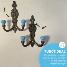Load image into Gallery viewer, Set of 2 𝗙𝗥𝗘𝗡𝗖𝗛 𝗦𝗧𝗬𝗟𝗘 𝗖𝗔𝗦𝗧 𝗜𝗥𝗢𝗡 𝗗𝗢𝗨𝗕𝗟𝗘 𝗛𝗢𝗢𝗞𝗦 – Duck Egg Blue Ceramic Tops, Wall Coat Hooks for Hallway, Cloakroom, Bedroom