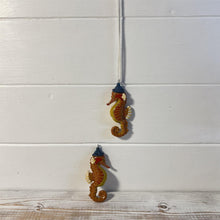 Load image into Gallery viewer, Pair of ceramic cute bobble hat Seahorse hanging ornaments | Light Pulls | Nautical Theme ceramic Cord Pull Light Pulls