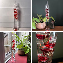 Load image into Gallery viewer, 30cm Tall Free Standing Galileo Thermometer with seven red floating globes | measures temperatures from 16 degrees Centigrade to 28 degrees | also in Fahrenheit | Weather station | Water Thermometer