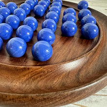 Load image into Gallery viewer, 30cm Diameter DARK WOOD SOLITAIRE BOARD GAME with OPAL BLUE Glass Marbles | |classic wooden solitaire game | strategy board game | family board game | games for one | board games