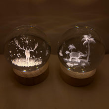 Load image into Gallery viewer, Set of Two 3D Crystal Ball Night Light USB Lamp with Reindeer and Elephant designs, elegant modern illumination for any room