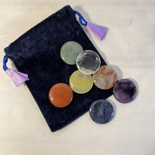 Load image into Gallery viewer, Set of 7 Chakra Discs supplied with a Velvet Bag | Discs include Clear Quartz, Amethyst, Sodalite, Green Aventurine, Yellow Onyx, Carnelian, and Red Jasper.
