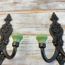 Load image into Gallery viewer, SET OF 2 CAST IRON FRENCH STYLE DOUBLE ORNATE HOOKS | Lime green Ceramic Ball Tops | Cloakroom Hook | Decorative Double Hook, hat and coat hook | 15cm x 11cm.