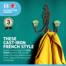 Load image into Gallery viewer, SET OF 2 CAST IRON FRENCH STYLE DOUBLE ORNATE HOOKS | Lime green Ceramic Ball Tops | Cloakroom Hook | Decorative Double Hook, hat and coat hook | 15cm x 11cm.