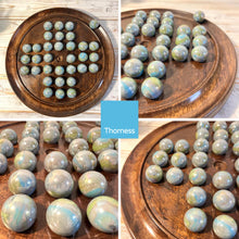 Load image into Gallery viewer, 30cm Diameter DARK WOOD SOLITAIRE BOARD GAME with THUNDERBOLT GLASS MARBLES | |classic wooden solitaire game | strategy board game | family board game | games for one | board games