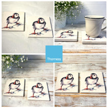 Load image into Gallery viewer, 2 x CURIOUS PUFFIN STONE COASTERS | Stone Coasters | Animal novelty gift | Coaster for glass, mugs and cups| Square coaster for drinks | Puffin gift | Meg Hawkins art | 10cm x 10cm