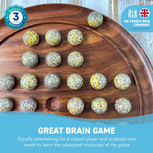 Load image into Gallery viewer, 30cm Diameter WOODEN SOLITAIRE BOARD GAME with SPECKLED GOLDEN SPINOSAURUS GLASS MARBLES | |classic wooden solitaire game | strategy board game | family board game | games for one | board games