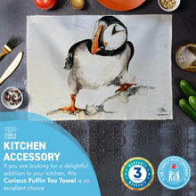 Load image into Gallery viewer, CURIOUS PUFFIN TEA TOWEL | 100% Cotton | Large kitchen towel for drying| Hand towel with group of Puffins | Puffin themed gift | Beach Gift | Cotton tea towel | 70 cm x 50 cm
