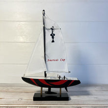 Load image into Gallery viewer, Americas Cup Model Yacht  - Black and Red hull | Sailing | Yacht | Boats | Models | Sailing Nautical Gift | Sailing Ornaments | Yacht on Stand | 23cm (H) x 16cm (L) x 3cm (W)
