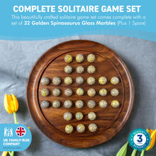 Load image into Gallery viewer, 30cm Diameter WOODEN SOLITAIRE BOARD GAME with SPECKLED GOLDEN SPINOSAURUS GLASS MARBLES | |classic wooden solitaire game | strategy board game | family board game | games for one | board games