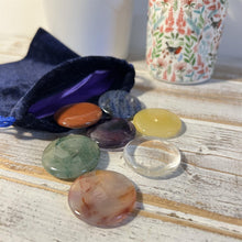 Load image into Gallery viewer, Set of 7 Chakra Discs supplied with a Velvet Bag | Discs include Clear Quartz, Amethyst, Sodalite, Green Aventurine, Yellow Onyx, Carnelian, and Red Jasper.