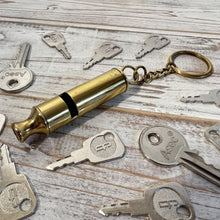 Load image into Gallery viewer, LOUD BRASS WHISTLE on keyring | emergency survival whistle | One piece | Outdoor survival whistle | supplied on Key-Chain or Hang Around Your Neck and Carry it Anywhere