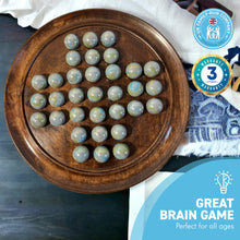 Load image into Gallery viewer, 30cm Diameter DARK WOOD SOLITAIRE BOARD GAME with THUNDERBOLT GLASS MARBLES | |classic wooden solitaire game | strategy board game | family board game | games for one | board games
