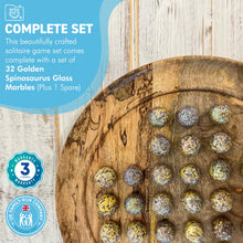 Load image into Gallery viewer, 30cm Diameter MANGO WOOD SOLITAIRE BOARD GAME with SPECKLED GOLDEN SPINOSAURUS GLASS MARBLES | |classic wooden solitaire game | strategy board game | family board game | games for one | board games