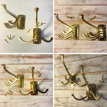 Load image into Gallery viewer, Set of Two Polished Brass 𝟯-𝗣𝗥𝗢𝗡𝗚 𝗦𝗪𝗜𝗩𝗘𝗟 𝗖𝗢𝗔𝗧 𝗛𝗢𝗢𝗞𝗦, Folding Wall Mount Hanger with Screws Included