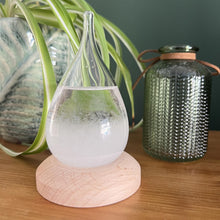 Load image into Gallery viewer, Storm Glass Tear drop shaped Weather Predictor Glass Barometer on a Wooden Base | Forecaster Creative Crystal Decorative Bottle Desktop Drops Forecast Bottle Home and Office Birthday