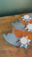 Load and play video in Gallery viewer, Set of Four Celestial Elegance: Brushed Silver Aluminum Shooting Star Tea Light Candle Holders, Modern Decorative Accent