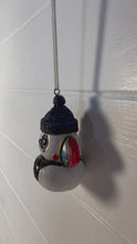 Load and play video in Gallery viewer, Pair of ceramic Cute Puffin hanging ornaments | Light Pull | Nautical Theme ceramic Cord Pull Light Pulls