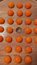 Load and play video in Gallery viewer, 22cm Diameter wooden SOLITAIRE BOARD GAME with OPAL ORANGE GLASS MARBLES | classic wooden solitaire game | strategy board game | family board game | games for one | board games