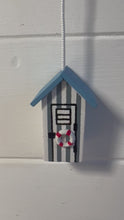 Load and play video in Gallery viewer, Light Blue and white beach hut light pull | Nautical Theme Wooden Beach Hut Cord Pull Light Pulls