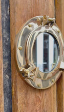 Load and play video in Gallery viewer, Nautical Brass Porthole Mirror - Wall Hanging Home Decor
