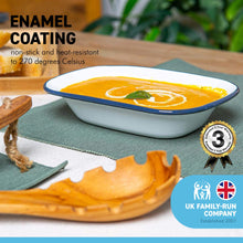 Load image into Gallery viewer, White 20cm long oval enamel Pie Dish with navy blue edging | Bring traditional style to your table