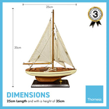 Load image into Gallery viewer, Detailed wooden assembled display model of an Americas Cup Racing Yacht with cream hull | ready for display | adjustable rigging blocks sewn cotton sails | length 25cm height 35cm