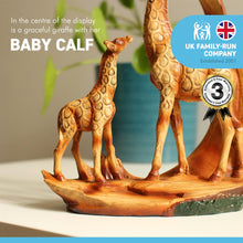 Load image into Gallery viewer, Eye catching free standing graceful giraffe and calf decorative ornament
