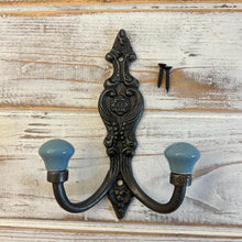 Load image into Gallery viewer, CAST IRON FRENCH STYLE DOUBLE ORNATE HOOKS | Duck Egg Blue Ceramic Ball Tops | Cloakroom Hook | Decorative Double Hook, hat and coat hook | 15cm x 11cm.