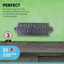 Load image into Gallery viewer, Cast Iron Antique Style MIND YOUR HEAD PLAQUE SIGN | 10cm (L) x 3cm (H) | Perfect for every house which has low beams | CAST METAL LOW BEAM MIND YOUR HEAD SIGN
