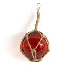 Load image into Gallery viewer, DEEP RED GLASS FISHING FLOAT ORNAMENTAL SEA BUOY | hand blown | nautical seafaring fishing rustic décor | 10cm diameter | with rustic brown string netting and hanging loop
