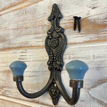 Load image into Gallery viewer, CAST IRON FRENCH STYLE DOUBLE ORNATE HOOKS | Duck Egg Blue Ceramic Ball Tops | Cloakroom Hook | Decorative Double Hook, hat and coat hook | 15cm x 11cm.
