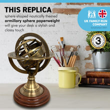 Load image into Gallery viewer, ARMILLARY SPHERE PAPERWEIGHT | NAUTICAL ORNAMENTAL PAPER WEIGHT | 13cm high | Revolving centre | Nautical gifts for desk | Machined brass mounted on hardwood |mantelpiece ornament