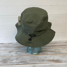 Load image into Gallery viewer, COUNTRY GREEN 58CM SHOWERPROOF BRIMMED TRILBY BUCKET STYLE HAT | Water-Repellent Bucket style Hat | 100% cotton | lightweight and breathable |foldable | Elasticated toggle for adjustable size
