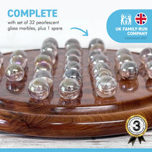 Load image into Gallery viewer, Wooden solitaire board game with pearlescent glass marbles Thuya wood | classic wooden solitaire game
