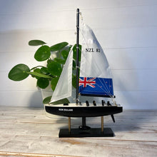 Load image into Gallery viewer, NEW ZEALAND AMERICAS CUP MODEL YACHT | Sailing | Yacht | Boats | Models | Sailing Nautical Gift | Sailing Ornaments | Yacht on Stand | 33cm (H) x 21cm (L) x 4cm (W)
